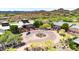 Aerial view of the clubhouse entrance with circular drive and desert landscaping at 3138 W Ravina Ln, Anthem, AZ 85086
