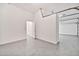 Clean garage space with finished flooring and overhead door access to the home at 3138 W Ravina Ln, Anthem, AZ 85086