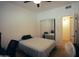 Comfortable bedroom with a mirrored closet and a calming atmosphere perfect for relaxation and rest at 3150 E Beardsley Rd # 1105, Phoenix, AZ 85050