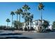 Beautiful community with lush greenery, well-maintained buildings, and palm trees under a clear sky at 3150 E Beardsley Rd # 1105, Phoenix, AZ 85050
