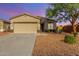 Charming single-story home featuring a two-car garage, xeriscape yard, and neutral paint scheme at 35751 N Bandolier Dr, San Tan Valley, AZ 85144