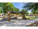 Community park featuring covered picnic pavilion with decorative stone supports at 35751 N Bandolier Dr, San Tan Valley, AZ 85144