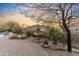 Desert home backyard featuring a stone fountain, desert plants, and lovely landscaping at 37170 N Granite Creek Ln, Carefree, AZ 85377