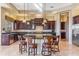 Spacious kitchen featuring a large island with seating and granite countertops at 37170 N Granite Creek Ln, Carefree, AZ 85377