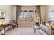Bright living room featuring large windows with desert views and elegant furnishings at 37170 N Granite Creek Ln, Carefree, AZ 85377