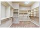 Spacious walk-in closet with custom shelving and ample storage, ready for organization at 37170 N Granite Creek Ln, Carefree, AZ 85377
