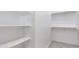 Walk-in closet featuring shelving, providing ample storage at 40715 W Georgia Ave, Tonopah, AZ 85354