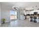 Bright dining area with backyard views, chandelier and access to the gourmet kitchen at 40715 W Georgia Ave, Tonopah, AZ 85354