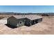 The aerial view captures a covered back patio, blending indoor/outdoor living with the serene desert landscape at 40715 W Georgia Ave, Tonopah, AZ 85354