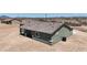The aerial shows a neat backyard, blending indoor comfort with the calming desert atmosphere at 40715 W Georgia Ave, Tonopah, AZ 85354
