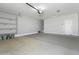Spacious garage with shelving, door to house, and space for two cars at 40715 W Georgia Ave, Tonopah, AZ 85354