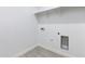 Laundry room featuring tile flooring, shelving, and laundry connections at 40715 W Georgia Ave, Tonopah, AZ 85354