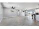 Spacious living room with tile flooring, ceiling fan, and ample natural light at 40715 W Georgia Ave, Tonopah, AZ 85354
