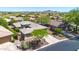 Aerial view of residential area featuring a well-manicured home with desert landscaping at 41229 N Belfair Way, Anthem, AZ 85086