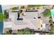 Drone shot of an estate-style home featuring a backyard pool and stone landscaping at 41229 N Belfair Way, Anthem, AZ 85086