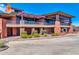 Luxury building featuring stone accents, spacious patios, and manicured landscaping at 41229 N Belfair Way, Anthem, AZ 85086