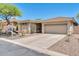 Well-maintained single-story home featuring a desert landscape at 41229 N Belfair Way, Anthem, AZ 85086