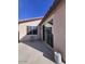 A covered back patio offers ample natural light through sliding glass doors at 4250 N 87Th Ln, Phoenix, AZ 85037