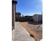 Backyard view shows the layout with a shed, small dog house and fence at 4250 N 87Th Ln, Phoenix, AZ 85037