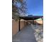 Covered gazebo with ladder access and a concrete floor for outdoor entertaining at 4250 N 87Th Ln, Phoenix, AZ 85037