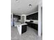 Updated kitchen with stainless steel appliances and white countertops at 4250 N 87Th Ln, Phoenix, AZ 85037