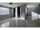 Bright living room featuring tile floors and natural light at 4250 N 87Th Ln, Phoenix, AZ 85037