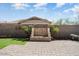 Private backyard with a stone water feature and patio offers a serene outdoor space for relaxation and entertaining at 4683 N 206Th Ln, Buckeye, AZ 85396