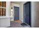 Cozy front porch with double doors and a charming 