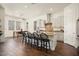 Bright kitchen with seating at the island, perfect for entertaining or casual dining at 4683 N 206Th Ln, Buckeye, AZ 85396
