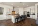 Well-equipped kitchen with stainless steel appliances, custom cabinets, and a granite countertop at 4683 N 206Th Ln, Buckeye, AZ 85396