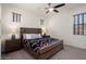 Comfortable main bedroom with neutral carpet and windows at 4683 N 206Th Ln, Buckeye, AZ 85396