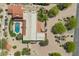An aerial view showcases a home with a backyard pool, pristine landscaping, and paver driveway at 4726 E Sierra Vista Dr, Paradise Valley, AZ 85253