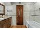 Full bathroom with granite countertops, wood cabinets, and a bathtub at 4726 E Sierra Vista Dr, Paradise Valley, AZ 85253
