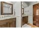 Bathroom featuring granite countertops, wood cabinets, and ceramic tile at 4726 E Sierra Vista Dr, Paradise Valley, AZ 85253