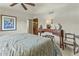 Inviting bedroom with a king-size bed, desk, vintage chair, and a neutral color palette at 4726 E Sierra Vista Dr, Paradise Valley, AZ 85253