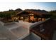 Upper-level covered patio with a fireplace and seating, offering stunning mountain views at 4726 E Sierra Vista Dr, Paradise Valley, AZ 85253