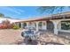 Exterior showcasing a fountain, covered walkway, and manicured landscaping at 4726 E Sierra Vista Dr, Paradise Valley, AZ 85253