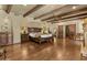 Large main bedroom featuring hardwood floors, exposed beam ceiling, and ensuite bath with vanity at 4726 E Sierra Vista Dr, Paradise Valley, AZ 85253