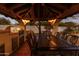 The covered patio features a built-in grill, a sink, and a dining table, perfect for outdoor cooking and entertaining at 4726 E Sierra Vista Dr, Paradise Valley, AZ 85253