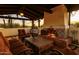 Cozy outdoor fireplace with sunset views at 4726 E Sierra Vista Dr, Paradise Valley, AZ 85253