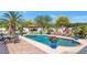 Inviting pool area with comfortable lounge chairs, a covered dining area, and mature landscaping for outdoor entertainment at 4726 E Sierra Vista Dr, Paradise Valley, AZ 85253
