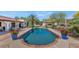 A refreshing pool with a tiled deck and lush landscaping creates a tranquil outdoor oasis for relaxation and enjoyment at 4726 E Sierra Vista Dr, Paradise Valley, AZ 85253