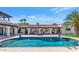 The backyard features a refreshing pool, a covered patio, and landscaped greenery, offering the perfect outdoor retreat at 4726 E Sierra Vista Dr, Paradise Valley, AZ 85253