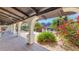 Covered walkway with elegant columns overlooking lush landscaping and mountain views at 4726 E Sierra Vista Dr, Paradise Valley, AZ 85253