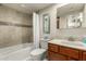 Clean and organized bathroom with a shower/tub combination, toilet, and vanity sink at 4850 E Desert Cove Ave # 227, Scottsdale, AZ 85254