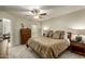 Comfortable bedroom with ceiling fan, dresser, and access to what seems like a balcony at 4850 E Desert Cove Ave # 227, Scottsdale, AZ 85254