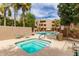 Inviting community pool area with a spa, lounge seating and beautiful landscaping at 4850 E Desert Cove Ave # 227, Scottsdale, AZ 85254
