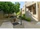 Community grill area situated in a landscaped courtyard, creating a welcoming atmosphere at 4850 E Desert Cove Ave # 227, Scottsdale, AZ 85254