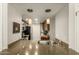 Kitchen with a stainless steel sink, granite countertops, and modern pendant lighting at 4850 E Desert Cove Ave # 227, Scottsdale, AZ 85254