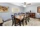 Bright dining room with ample seating, stylish decor, and abundant natural light, ideal for gatherings at 520 W Port Royale Ln, Phoenix, AZ 85023